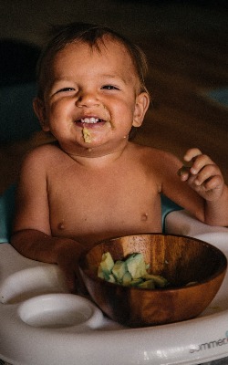 baby eating real food